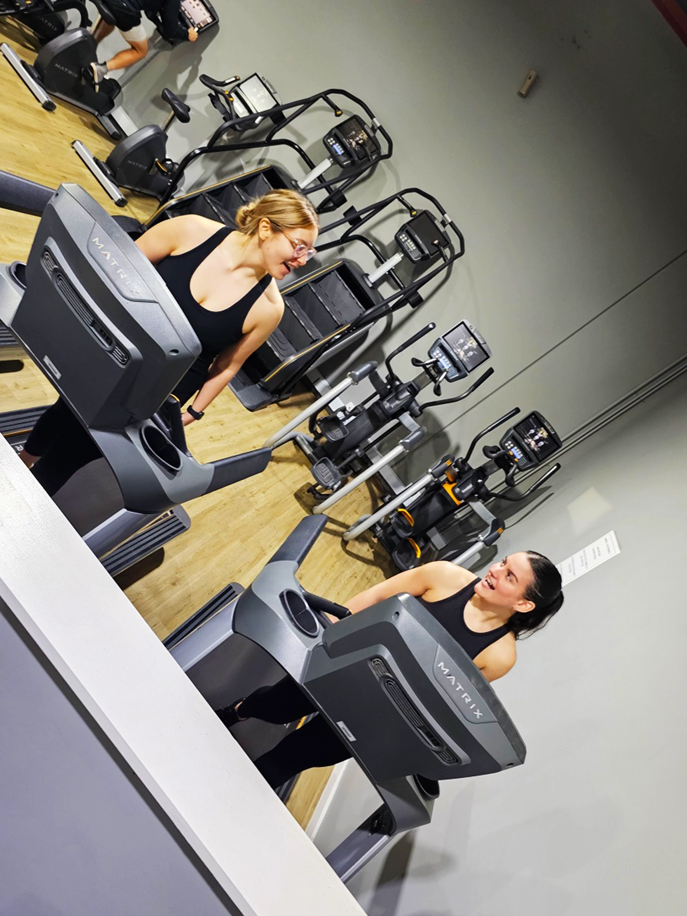 woman walking on treadmills at the gym