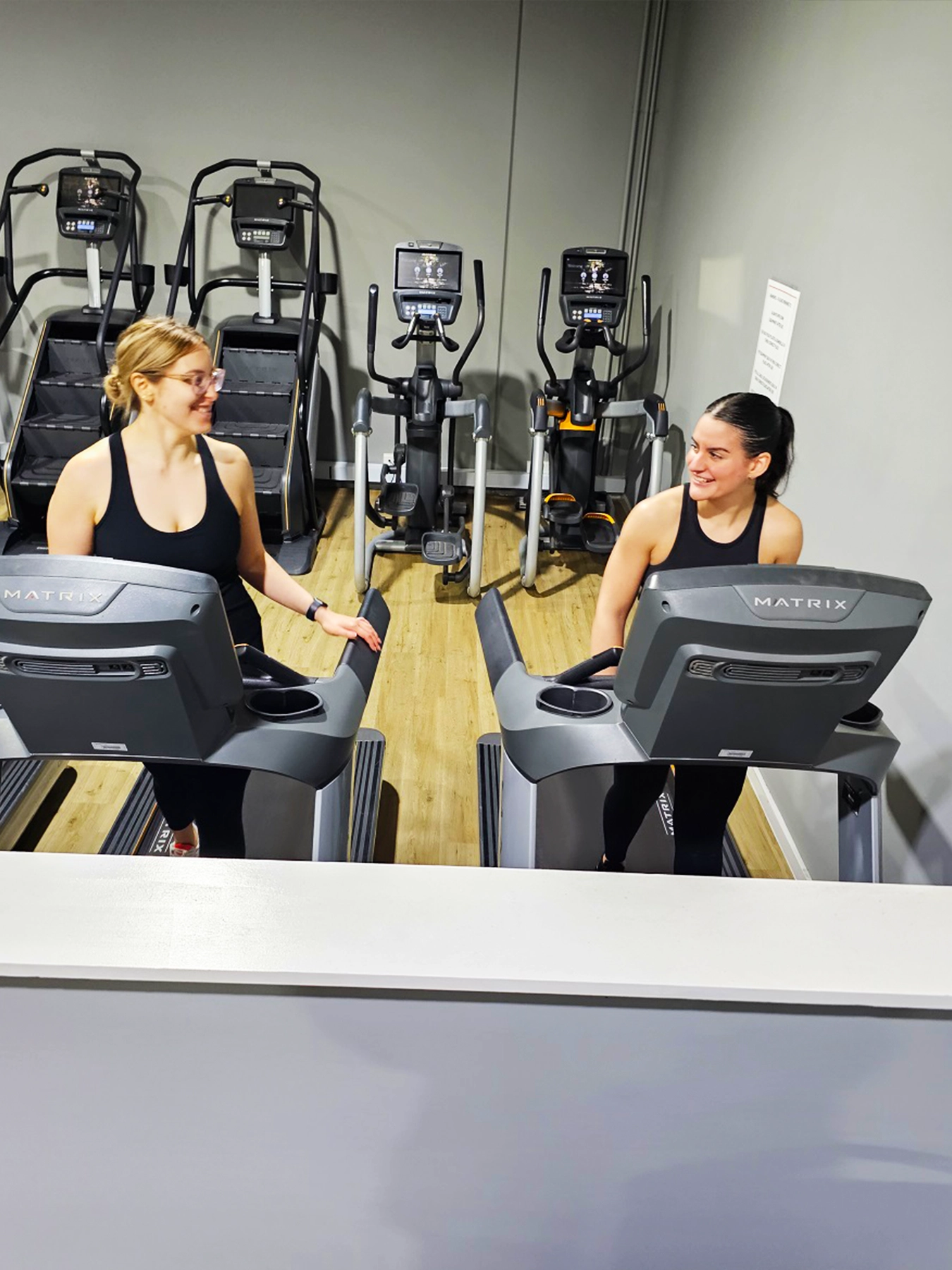 woman walking on treadmills at the gym