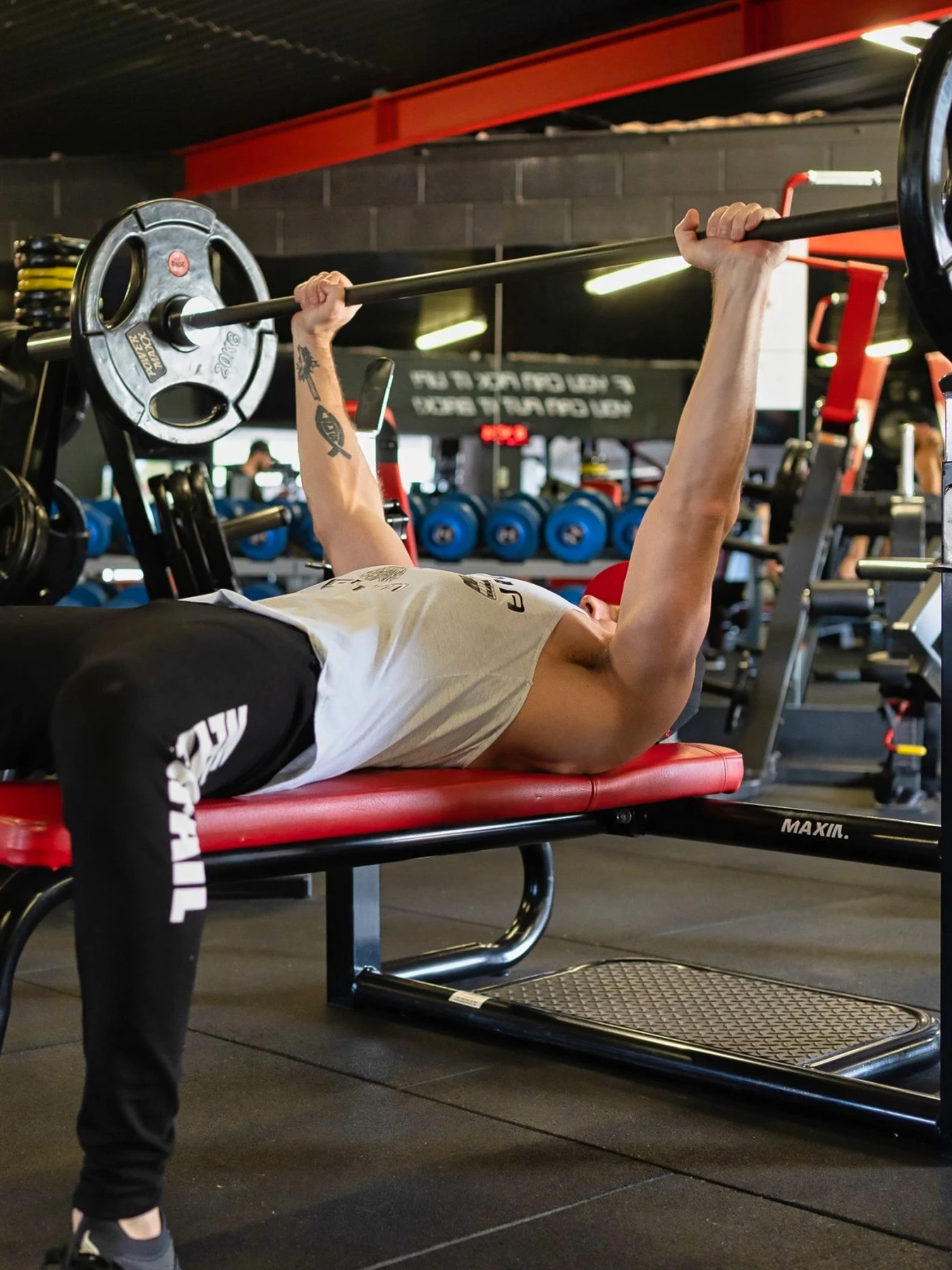 man lifting weights