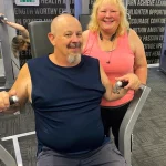 happy people working out at the gym